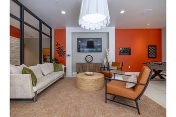 Mingle lounge with gaming area, hdtv, and ample comfortable seating